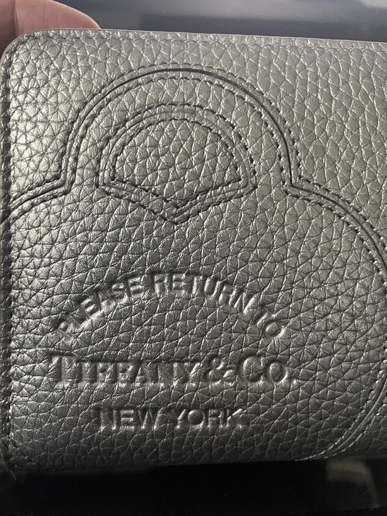 Tiffany & Co. Handbags - Tiffany & Co. Metallic Silver Pebbled Leather Large Zip Wallet w/Embossed Logo